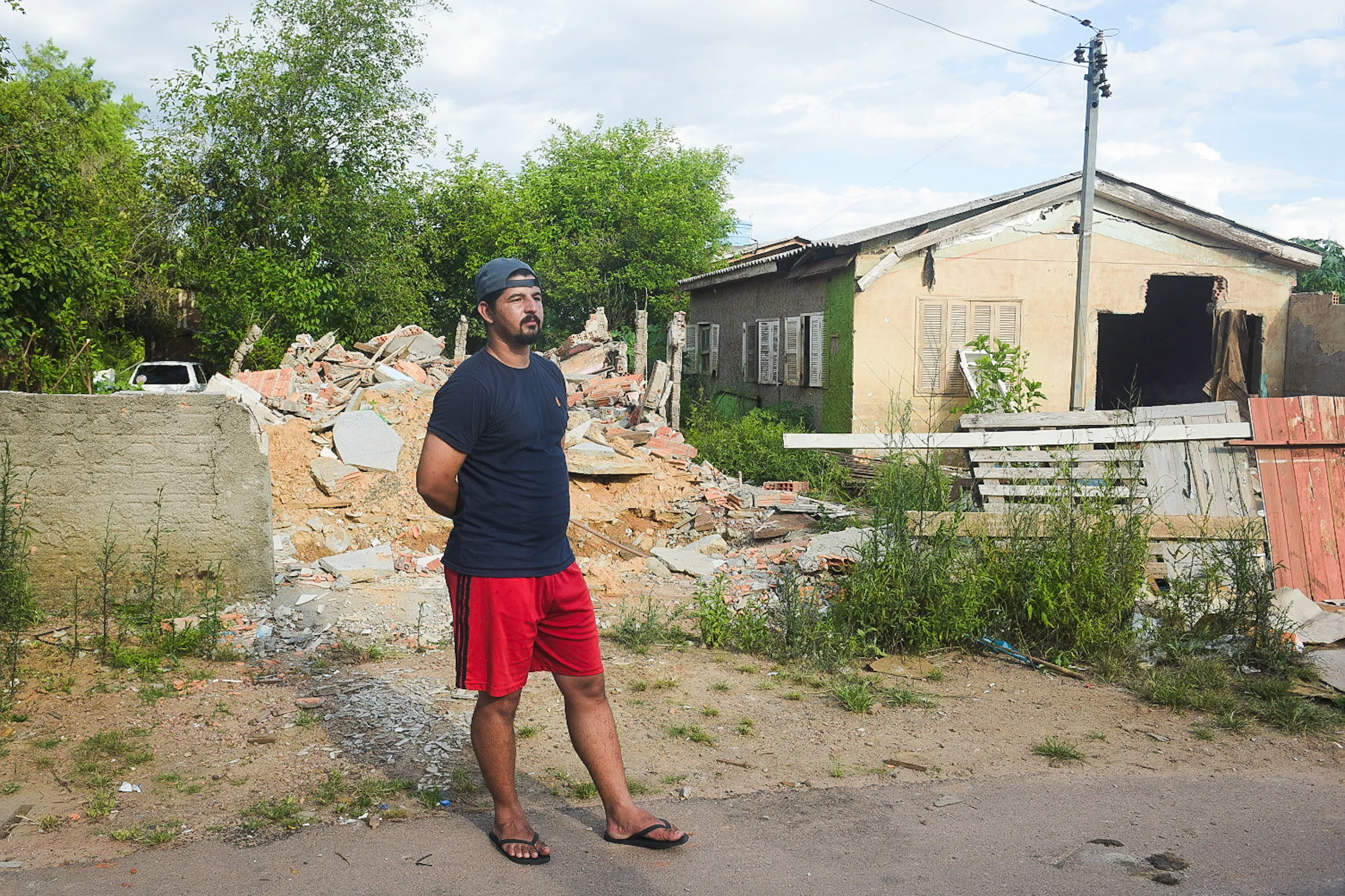 Arisson Freitas would like to remain in the town, but the 2024 floods left him with little choice. Photo by Alass Derivas.
