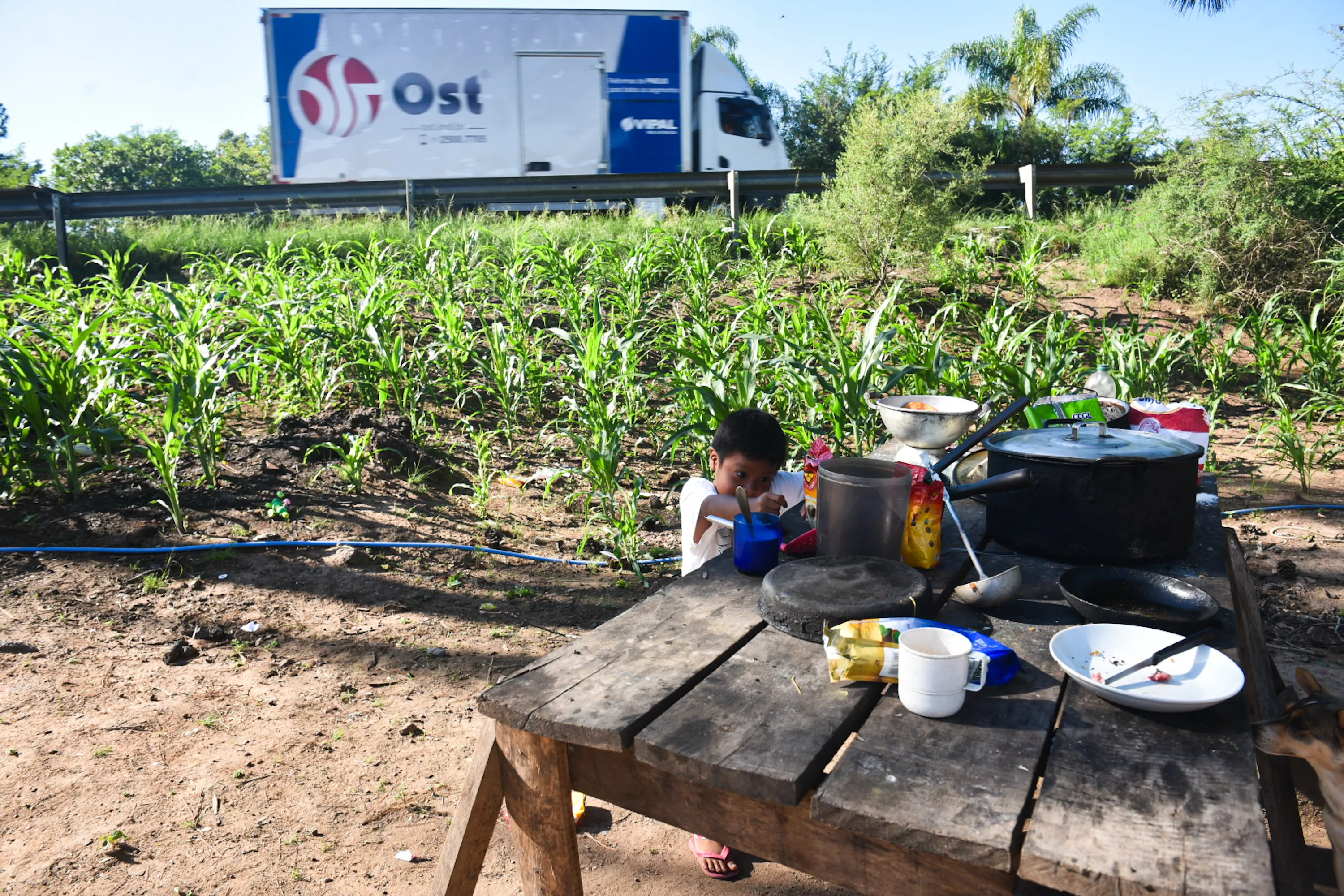 The indigenous community is now located in a small area on the side of a road, putting the community at risk of road accidents. Photo by Alass Derivas.