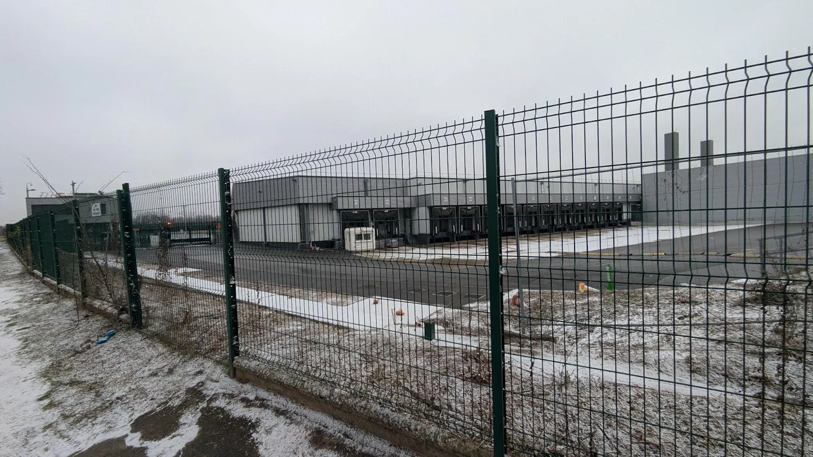 The site of the CyrusOne complex as seen from the street. Data integrity association Data For Good is challenging the company's plan to expand the center's capacity, saying the company was able to get around France's regulatory thresholds. Photo by Mathilde Saliou