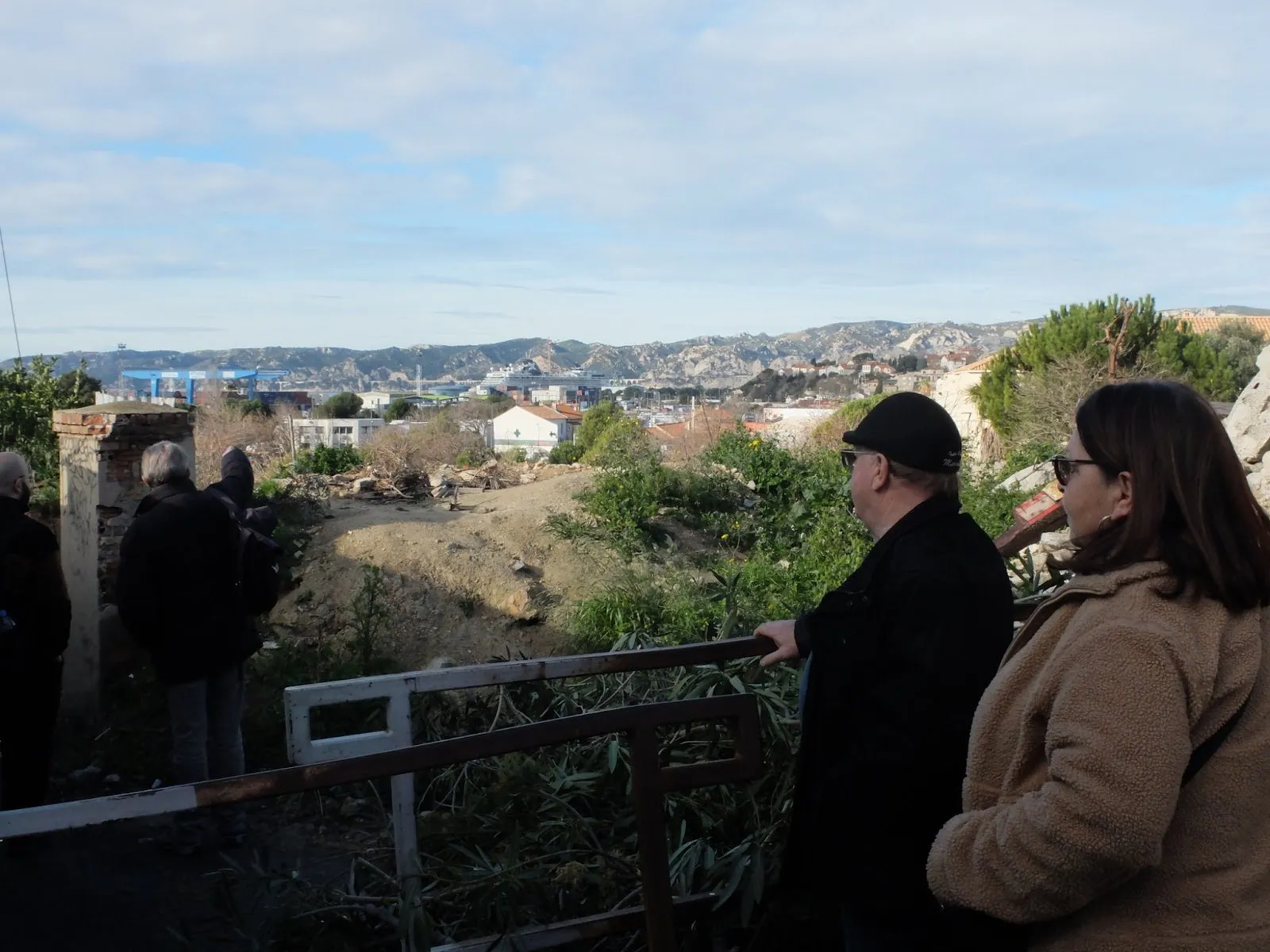 A CIQ leader Elisabeth Pelliccio (right) and her husband Denis gazing at the construction site of the massive AI City data center, which they say, is going ahead despite lack of any proper public consultation. Photo by Romane Frachon